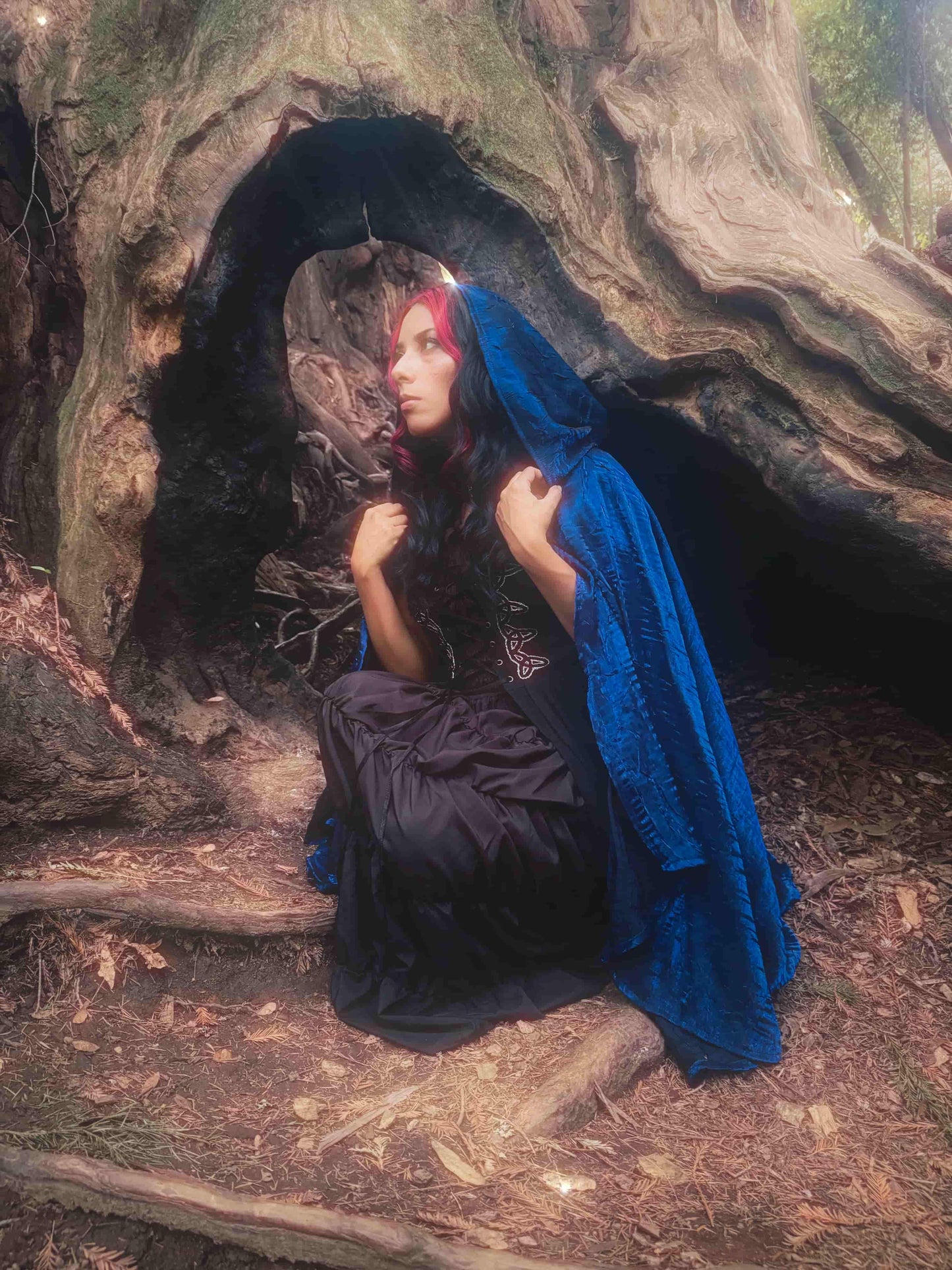 Handmade enchanting short layered dark blue iridescent lightweight cape, perfect for renaissance fairs, fantasy costumes, and magical cottagecore fashion.