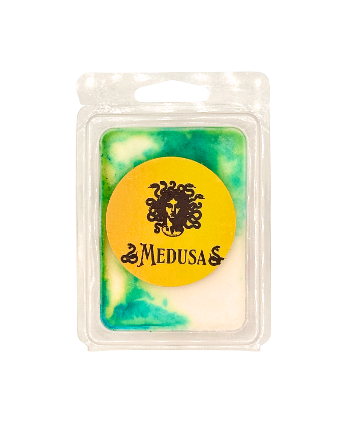 Wax melt in a clear packaging with 'Medusa' label on a white background