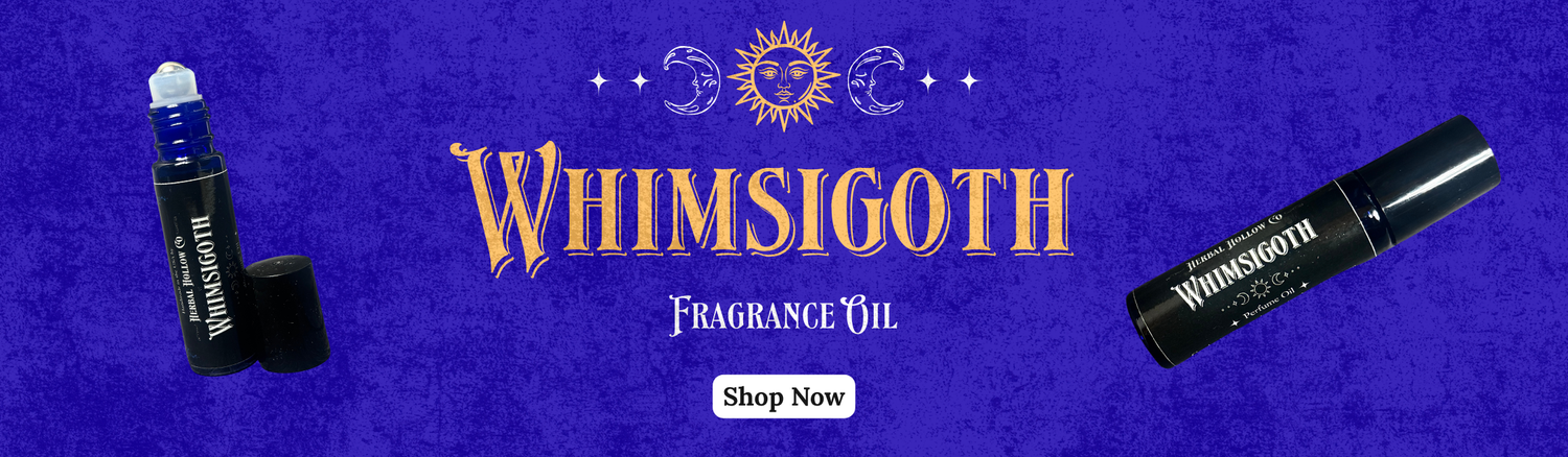 Whimsigoth fragrance oil packaging on a purple background with celestial symbols.