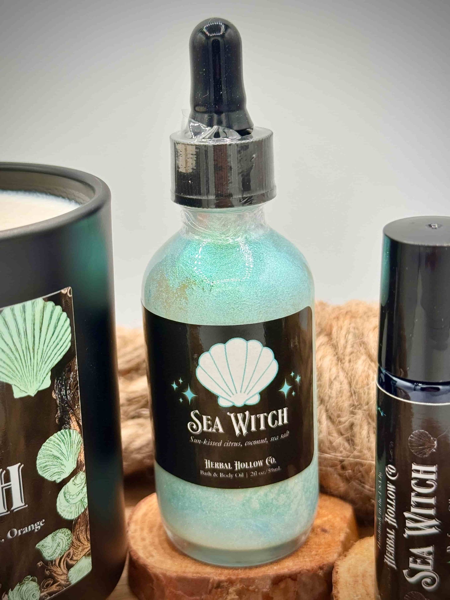 Sea Witch body oil product on wooden surface.