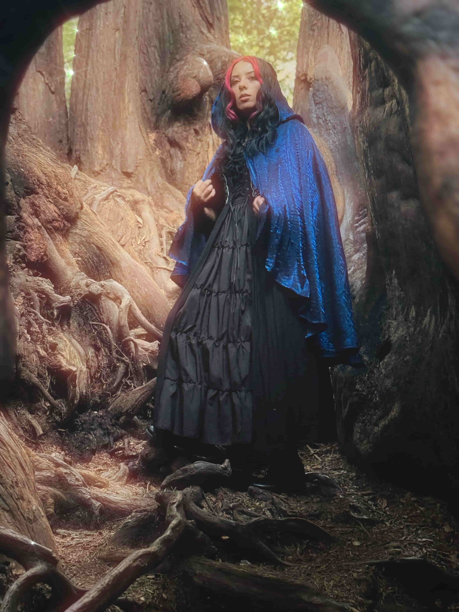 Handmade enchanting short layered dark blue iridescent lightweight cape, perfect for renaissance fairs, fantasy costumes, and magical cottagecore fashion.