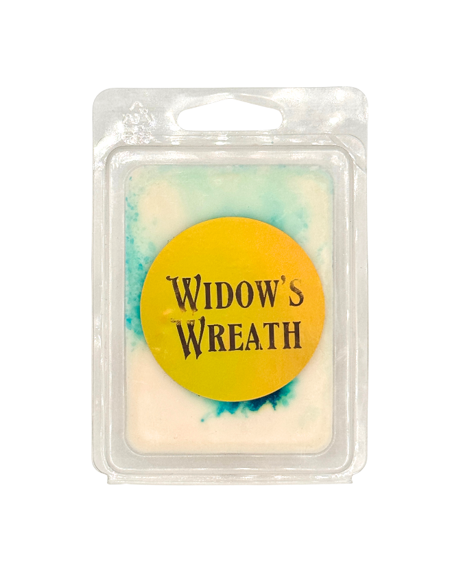 Wax melt in a clear packaging with "Widow's Wreath" label on a white background