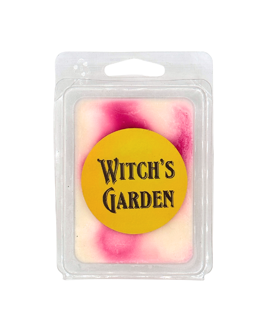 Wax melt in a clear packaging with 'Witch's Garden' label on a white background